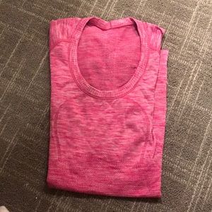 Pink short-sleeve lululemon workout top